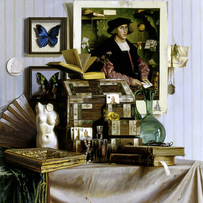 Still life with a portrait by Holbein.