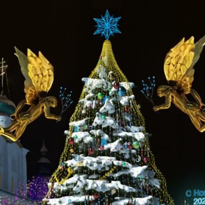 Angels light the Christmas tree