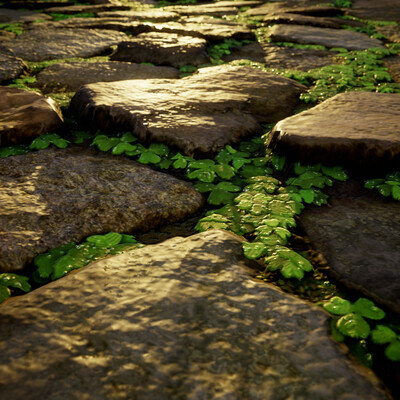 Cobblestone masonry overgrown with clover
