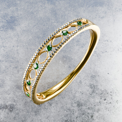 Gold ring with emeralds