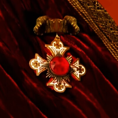 Puss in Boots's Golden Ruby Cross
